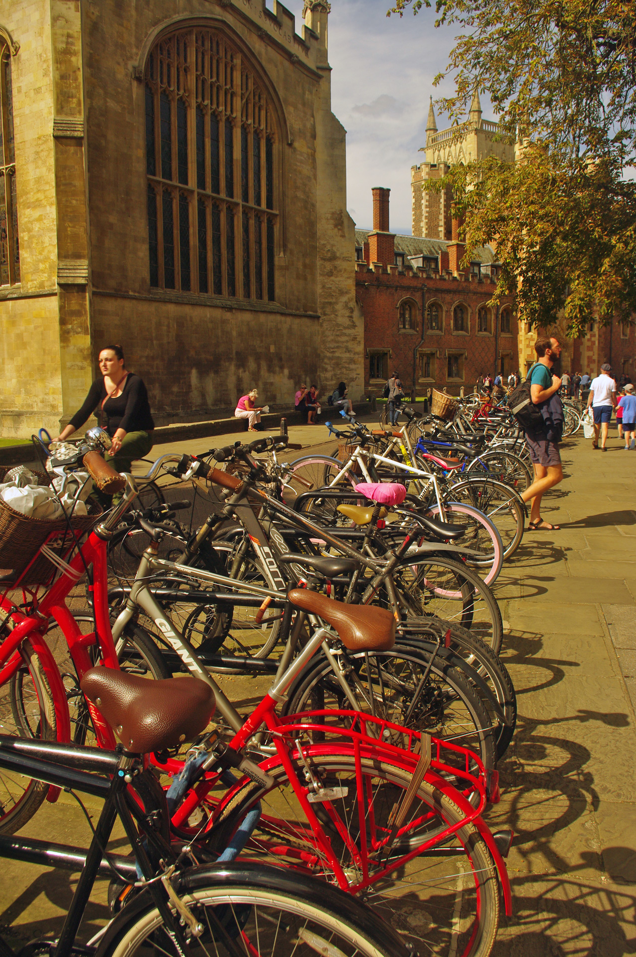 cambridge Bicycles parked Trinity Street east window Trinity College Chapel